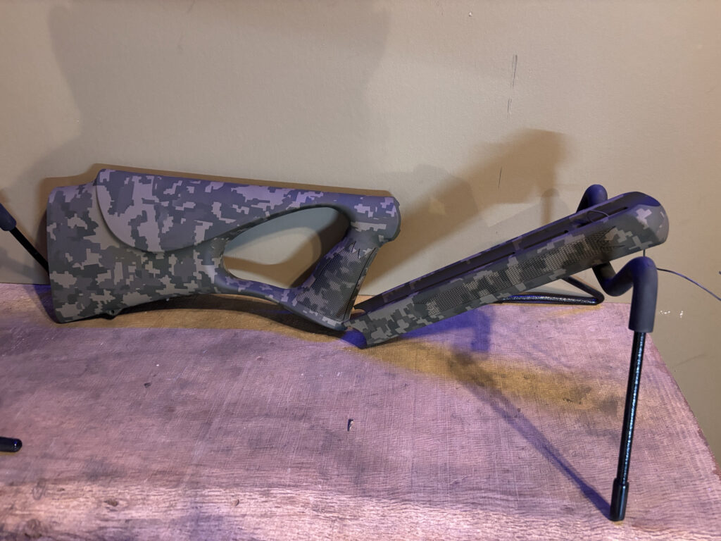 Actual ABIS Arms work: gray digital-camouflage Cerakote finish on a rifle stock and fore-end