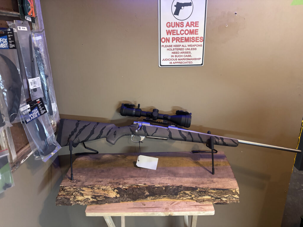 ABIS Arms Cerakote work: gray patterned rifle stock on bolt-action scoped rifle