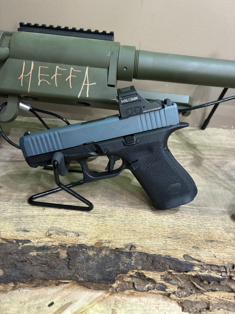 ABIS Arms Cerakote project: blue-coated slide on pistol with black grip
